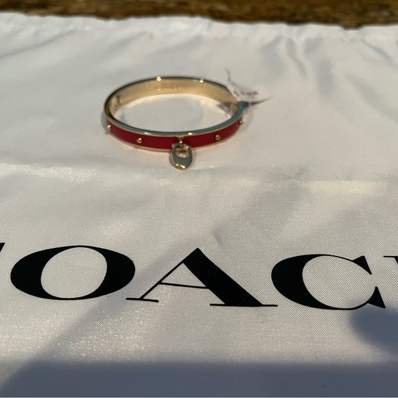 Coach red enamel cuff NWT